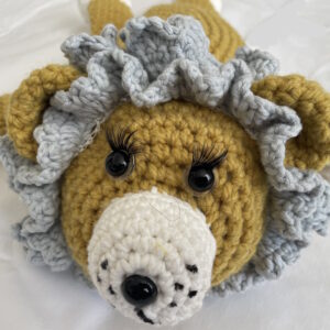 Therapietier Löwe mit Kirschkernkissen